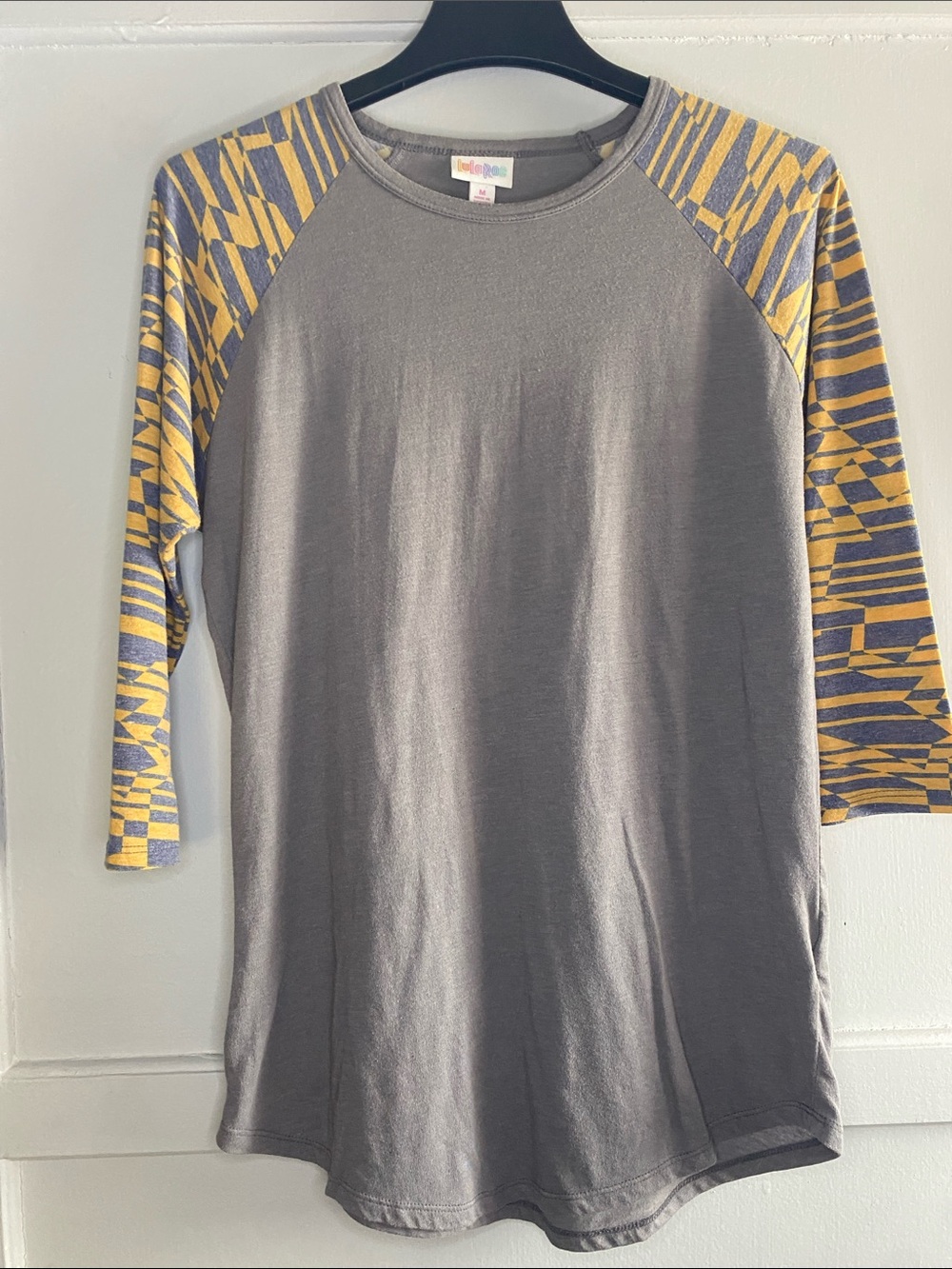 LuLaRoe Gray Baseball Tee with Yellow Patterned Raglan Sleeves - size Medium